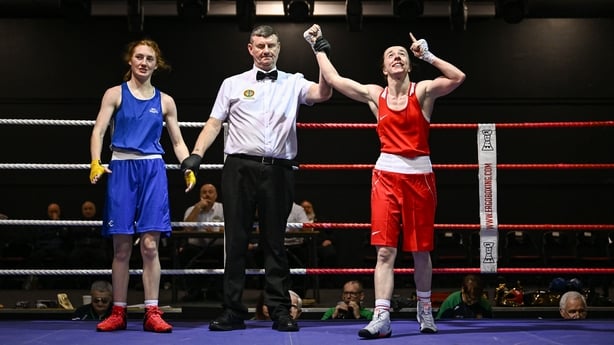 Shannon Sweeney of St Annes BC in Mayo, right, celebrates after victory over Rachel Lawless of St Brigid's in Edenderry, Offaly, during the 51kg quarter-final bout on day one of the 2026 National Elite Boxing Championships at the National Stadium in Dublin.