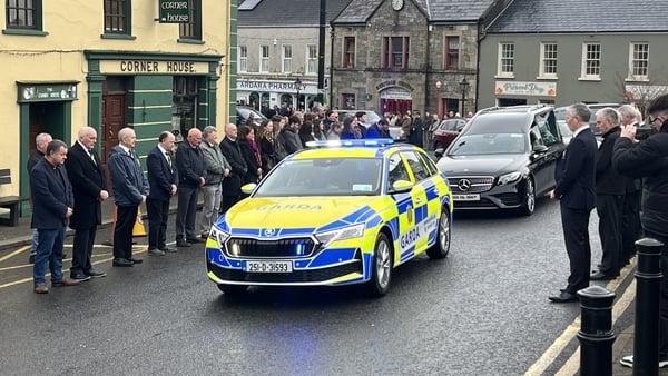 The funeral cortege of Stephen McCahill passes his Corner House pub