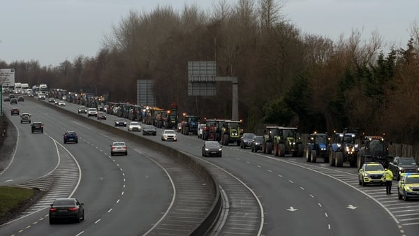 Tractors on a motorway as farmers take part in a protest