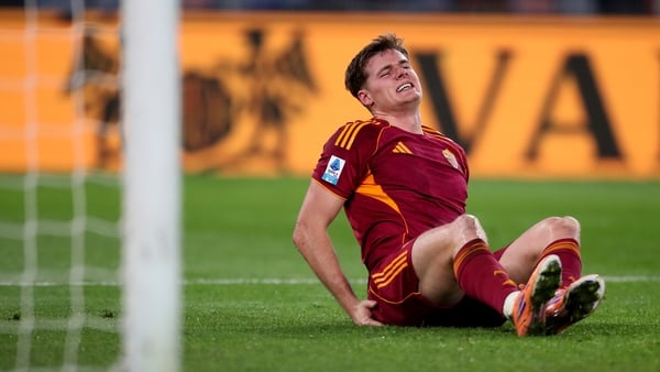 Roma striker Evan Ferguson goes down injured during the Serie A clash with Sassuolo Calcio at Stadio Olimpico
