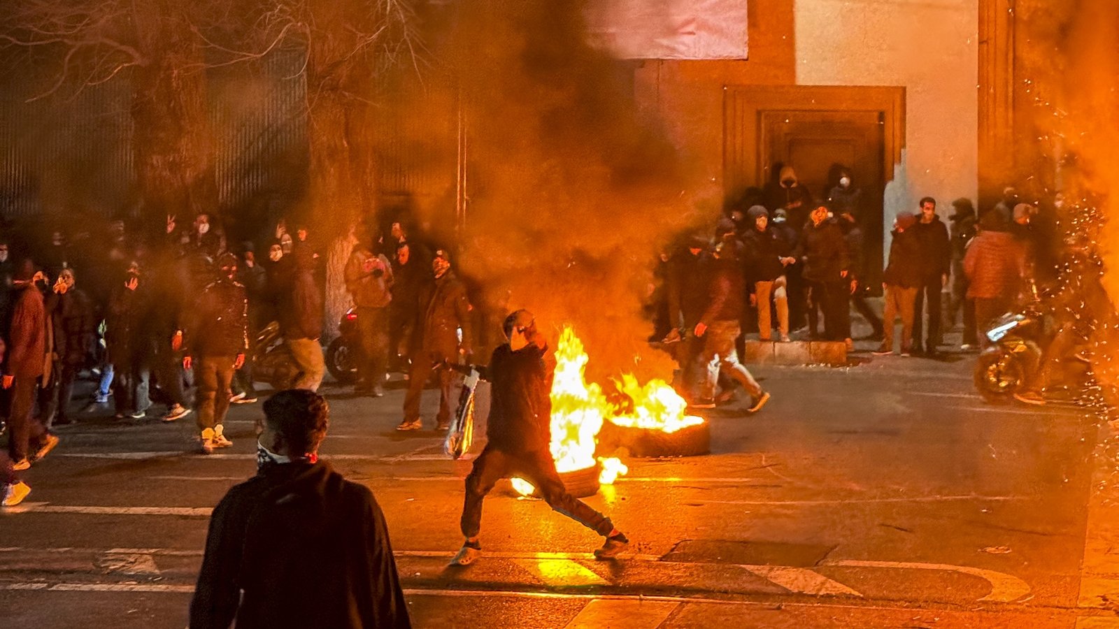 Anti-government chants filled the streets of Iran's capital tonight, as protesters pressed the biggest movement against the Islamic republic in more than three years despite a deadly crackdown under cover of an internet blackout.
