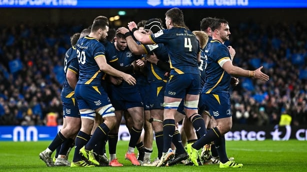 10 January 2026; Leinster players celebrate after Harry Byrne, centre, converted an 80th minute penalty to give his side a 25-24 victory during the Investec Champions Cup match between Leinster and La Rochelle at the Aviva Stadium in Dublin. Photo by Seb Daly/Sportsfile