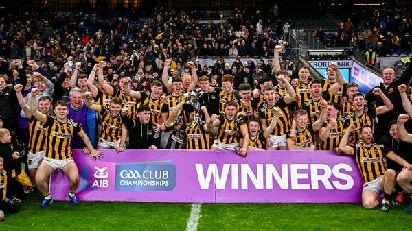 Upperchurch-Drombane players and coaches celebrate with the cup after their side's victory in the AIB GAA Hurling All-Ireland Intermediate Club Championship final match between Tooreen of Mayo and Upperchurch-Drombane of Tipperary at Croke Park in Dublin.