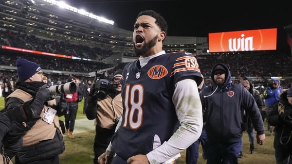 CHICAGO, ILLINOIS - JANUARY 10: Caleb Williams #18 of the Chicago Bears celebrates after an NFL Wild Card game against the Green Bay Packers at Solider Field on January 10, 2026 in Chicago, Illinois. (Photo by Todd Rosenberg/Getty Images)