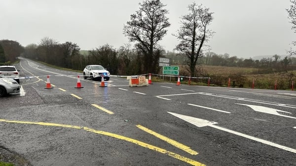 Garda at a cordon near a road crash on the N22 in County Kerry
