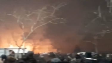 Fires burn, protesters chant in northeastern Iran as unrest grows across country