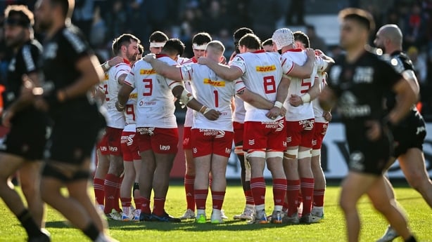 11 January 2026; Munster players huddle during the Investec Champions Cup match between RC Toulon and Munster at Stade Felix Mayol in Toulon, France. Photo by Shauna Clinton/Sportsfile