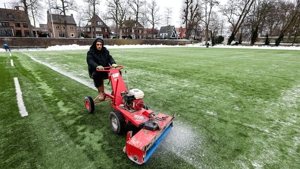 Dukes Rugby Club members working to prepare the pitch prior to Ulster's Challenge Cup match against the Toyota Cheetahs
