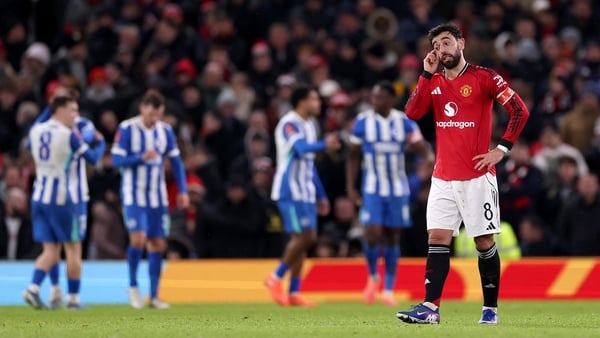 Bruno Fernandes of Manchester United looks dejected after Danny Welbeck (not pictured) of Brighton & Hove Albion scores his team's second goal during the Emirates FA Cup Third Round match between Manchester United and Brighton & Hove Albion at Old Traffor