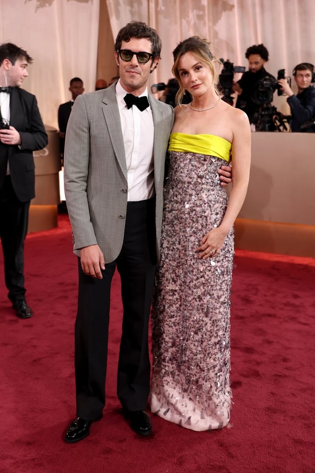 Adam Brody and Leighton Meester attend the 83rd annual Golden Globe Awards