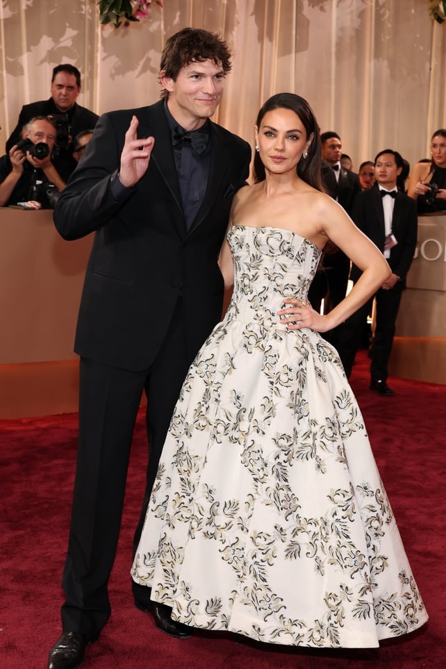 Ashton Kutcher and Mila Kunis attend the 83rd Annual Golden Globe Awards at The Beverly Hilton