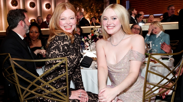 Sarah Snook and Dakota Fanning at the 83rd Annual Golden Globes