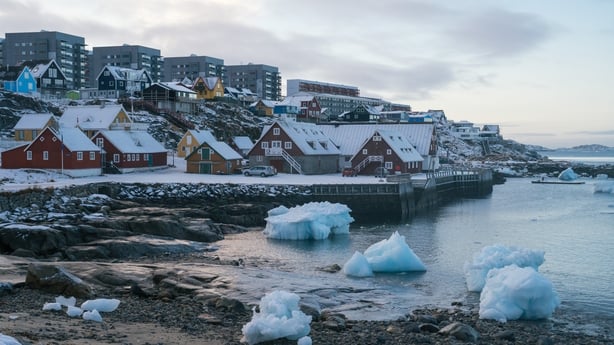 Painted houses and residential apartment blocks overlooking the fjord in Nuuk, Greenland,