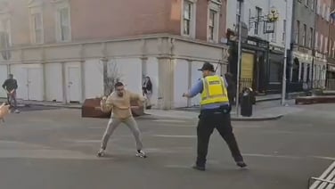 Footage shows man attacking two gardaí in Dublin city