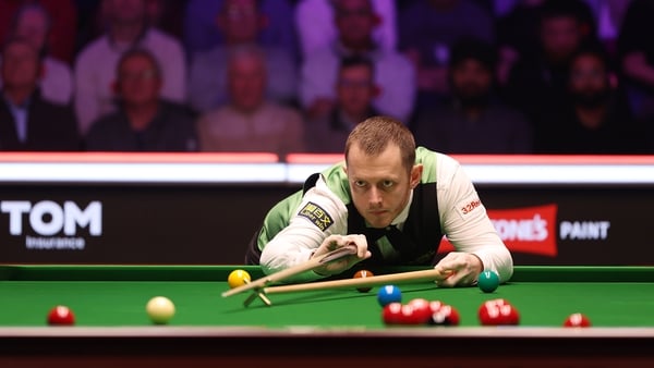 LONDON, ENGLAND - JANUARY 12: Mark Allen of Northern Ireland plays a shot during his first round match against Mark Williams of Wales (not pictured) during day two of the Johnstone's Paint Masters at Alexandra Palace on January 12, 2026 in London, England