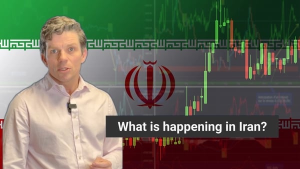 Journalist Fergal Gallagher agains an Iranian flag background