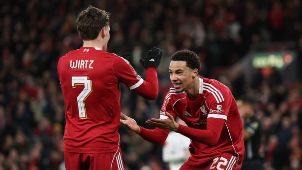 Hugo Ekitike of Liverpool celebrates scoring a goal with team mate Florian Wirtz during the Emirates FA Cup Third Round match between Liverpool and Barnsley on January 12, 2026 in Liverpool, England. 