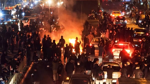 People attend a cost of living protest in the Iranian capital Tehran