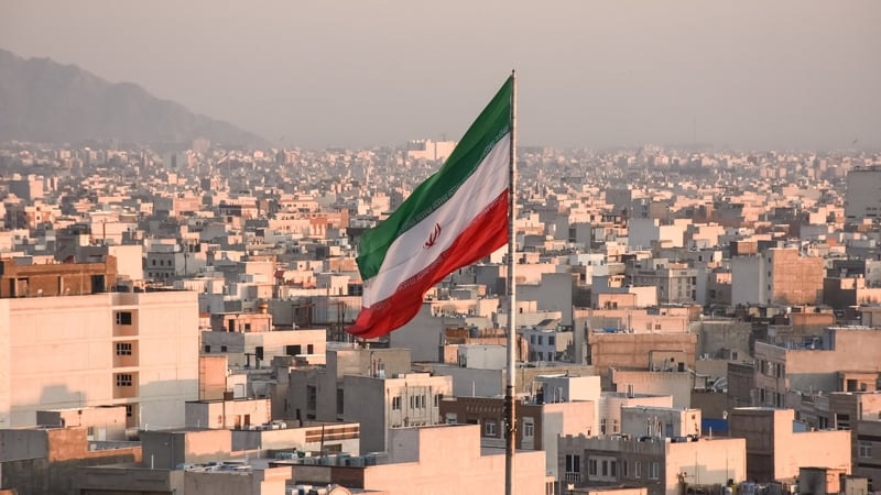 An Iranian flag over the Iranian capital, Tehran