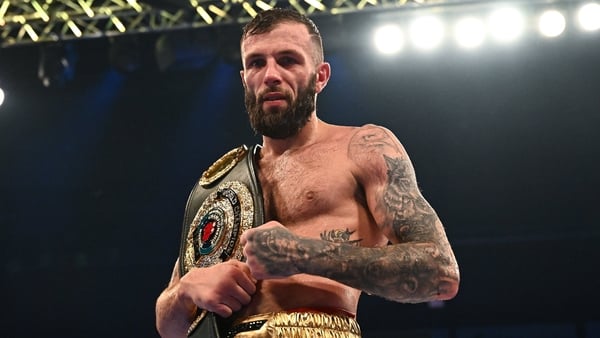Anthony Cacace celebrates defeating Damian Wrzesinski in their IBO World Super-Featherweight title bout at the SSE Arena in Belfast