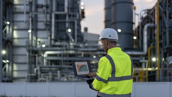 gas industry worker with a high vis jacket working