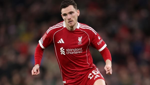 LIVERPOOL, ENGLAND - JANUARY 12: Andrew Robertson of Liverpool drives the ball during the Emirates FA Cup Third Round match between Liverpool and Barnsley at Anfield Stadium on January 12, 2026 in Liverpool, England. (Photo by MB Media/Getty Images)