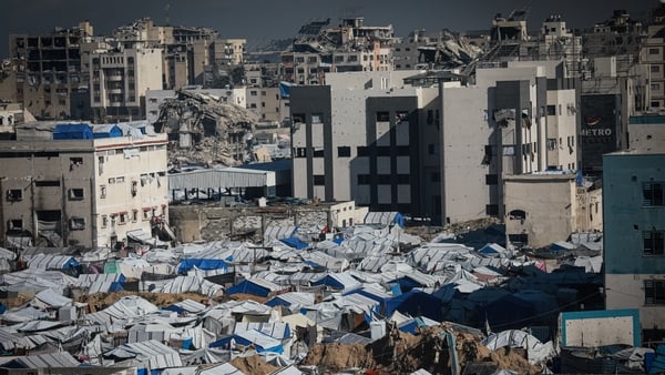 GAZA CITY, GAZA - JANUARY 15: The heavily damaged Islamic University becomes a makeshift shelter for Palestinian families displaced by Israeli attacks in Gaza City, Gaza on January 15, 2026. Families forced to flee their homes now live in makeshift tents