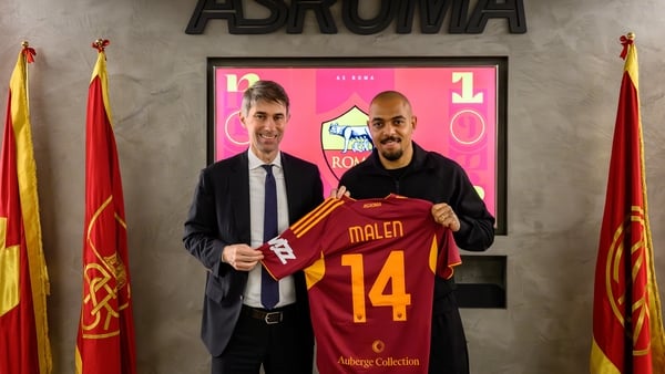 The player Donyell Malen poses with the AS Roma Sports Director Frederic Massara after signing a contract for the club at Centro Sportivo Fulvio Bernardini on January 16, 2026 in Rome, Italy.