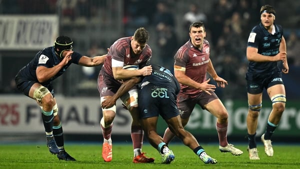 13 December 2024; Jack O'Donoghue of Munster is tackled by Andrea Cocagi of Castres Olympique during the Champions Cup Pool 3 match between Castres Olympique and Munster at Stade Pierre Fabre in Castres, France. Photo by Brendan Moran/Sportsfile