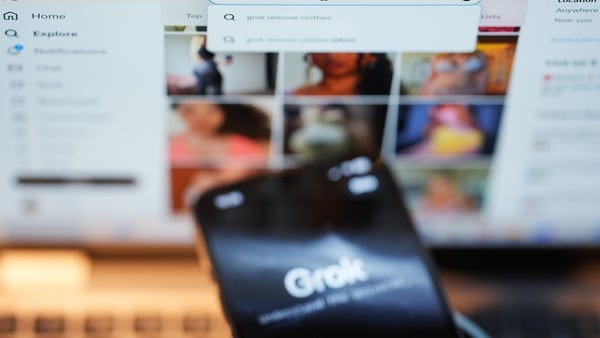 The Grok app on an iPhone against the backdrop of search results displayed on the social media platform X