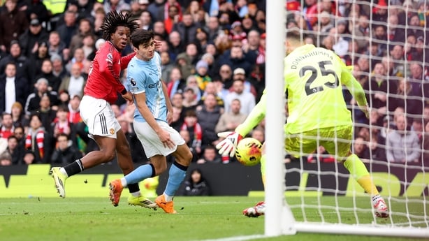 MANCHESTER, ENGLAND - JANUARY 17: Patrick Dorgu of Manchester United has a shot saved by Gianluigi Donnarumma of Manchester City during the Premier League match between Manchester United and Manchester City at Old Trafford on January 17, 2026 in Manchester, England. (Photo by Carl Recine/Getty Image