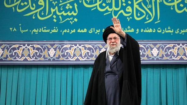 Iran's Supreme Leader Ali Khamenei greets the crowd as he attends a program held in the capital Tehran, Iran 