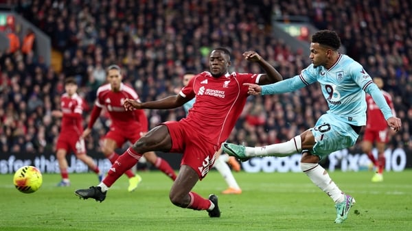 Marcus Edwards of Burnley scores his team's first goal during the Premier League match between Liverpool and Burnley at Anfield on January 17, 2026 in Liverpool, England.