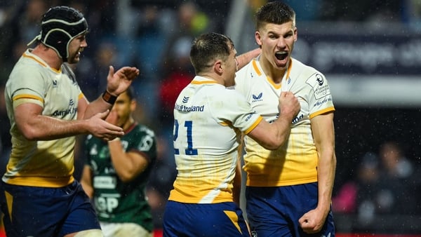 17 January 2026; Sam Prendergast of Leinster, right, celebrates with teammates Luke McGrath, centre, and Caelan Doris, left, after scoring their side's second try during the Investec Champions Cup match between Bayonne and Leinster at the Stade Jean Dauge