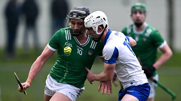 Gearóid Hegarty of Limerick in action against Sean Mackey of Waterford - 2026 Munster HL final