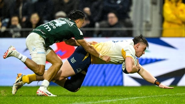 17 January 2026; Dan Sheehan of Leinster scores his side's first try despite the tackle of Tom Spring of Aviron Bayonnais during the Investec Champions Cup match between Bayonne and Leinster at the Stade Jean Dauger in Bayonne, France. Photo by Brendan Moran/Sportsfile