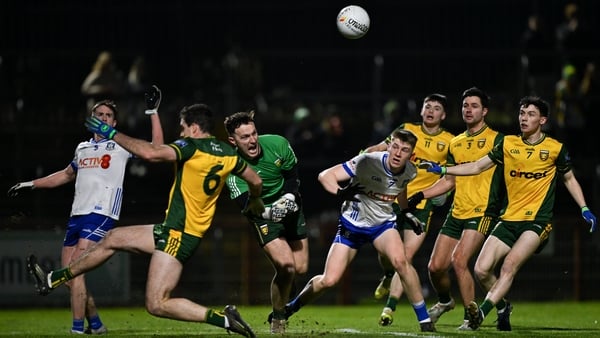 Donegal goalkeeper Gavin Mulreany makes a save from Thomas Hughes of Monaghan during the Bank of Ireland Dr McKenna Cup final match between Donegal and Monaghan at O'Neills Healy Park in Omagh, Tyrone.