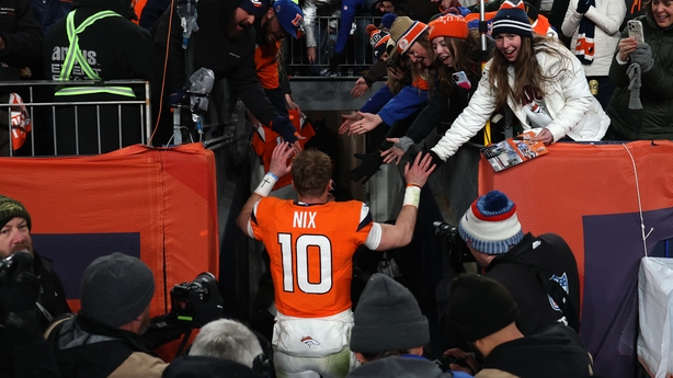 Bo Nix of the Denver Broncos celebrates with fans as he leaves the field after defeating the Buffalo Bills in overtime of the AFC divisional play-off game, January 2026