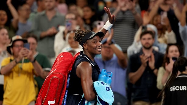 USA's Venus Williams acknowledges the applause as she walks off the court after losing to Serbia's Olga Danilovic in their women's singles match on day one of the Australian Open in Melbourne on January 18, 2026.