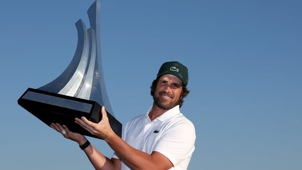 Nacho Elvira of Spain poses for a photo with the trophy following victory on day four of the Dubai Invitational 2026 at Dubai Creek Resort on January 18, 2026 in Dubai, United Arab Emirates. 