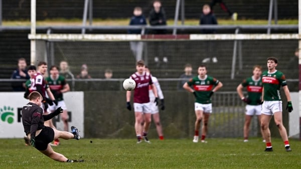 Galway goalkeeper Conor Flaherty slips as he kicks a free during the FBD Connacht League final match between Galway and Mayo at Tuam Stadium in Galway.