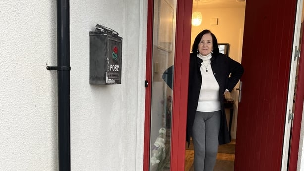 Jean Cosgrove outside her home