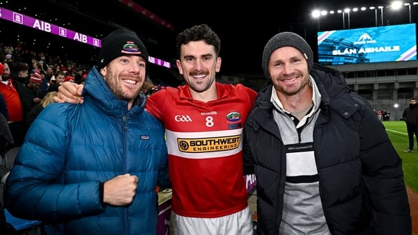 18 January 2026; Dingle's Mark O'Connor, centre, celebrates with his Australian Football League club teammates Cameron Gutherie, left, and Patrick Dangerfield of Geelong Football Club after the AIB GAA Football Senior Club Championship final match between