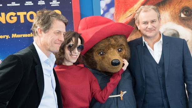 WESTWOOD, CA - JANUARY 06: (L-R) Hugh Grant, Sally Hawkins, Paddington and Hugh Bonneville attend the premiere of Warner Bros. Pictures "Paddington 2" at Regency Village Theatre on January 6, 2018 in Westwood, California. (Photo by Earl Gibson III/Getty Images)