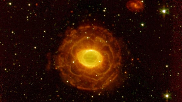 a thick cylinder of glowing gas and dust around a doomed star.
