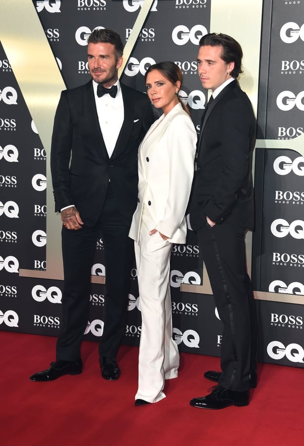 03/09/19 of David Beckham (left), Victoria Beckham and Brooklyn Beckham arriving at the GQ Men of the Year Awards 2019 in association with Hugo Boss, held at the Tate Modern in London. Brooklyn Beckham, the oldest son David and Victoria Beckham, has made headlines with a string of posts on his Insta