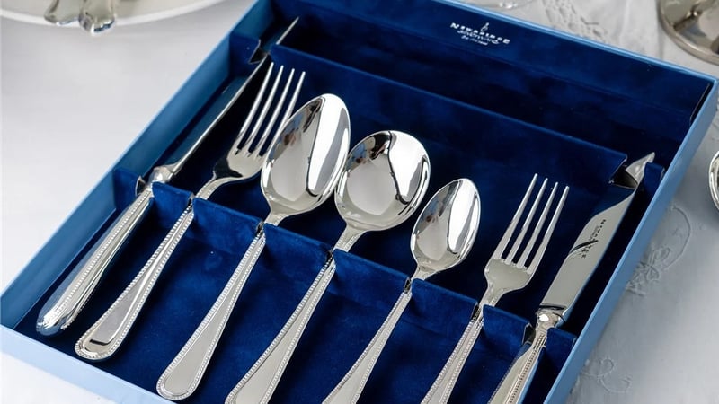 Image of silver plated cutlery set on a table