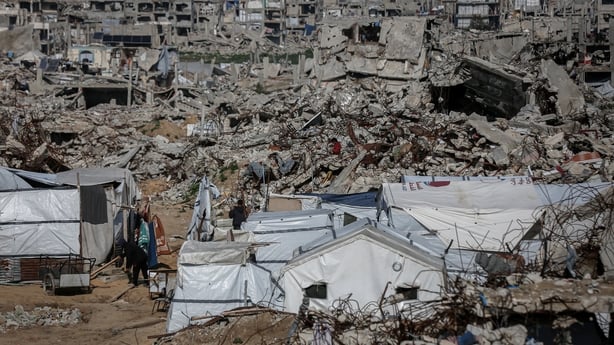 The tents of displaced Palestinians near destroyed buildings in Gaza City, Gaza, on Monday, Jan. 19, 2026. US President Donald Trump's proposed Board of Peace has got off to a rough start: questioned by Europe, criticized by Israel and celebrated by friends of the Kremlin. Photographer: Ahmad Salem/