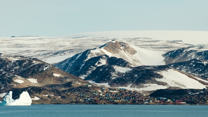 Ittoqqortoormiit village in Greenland. 'Climate change has major implications for the availability of many of Greenland's natural resources that are currently blanketed by kilometres of ice.' Photo: Getty Images