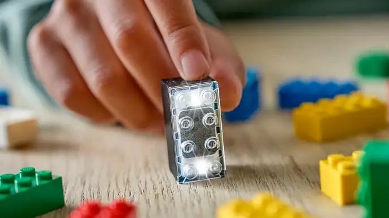 Lego's new Smart Brick: 'a compact embedded system disguised as a toy'. Photo: Lego